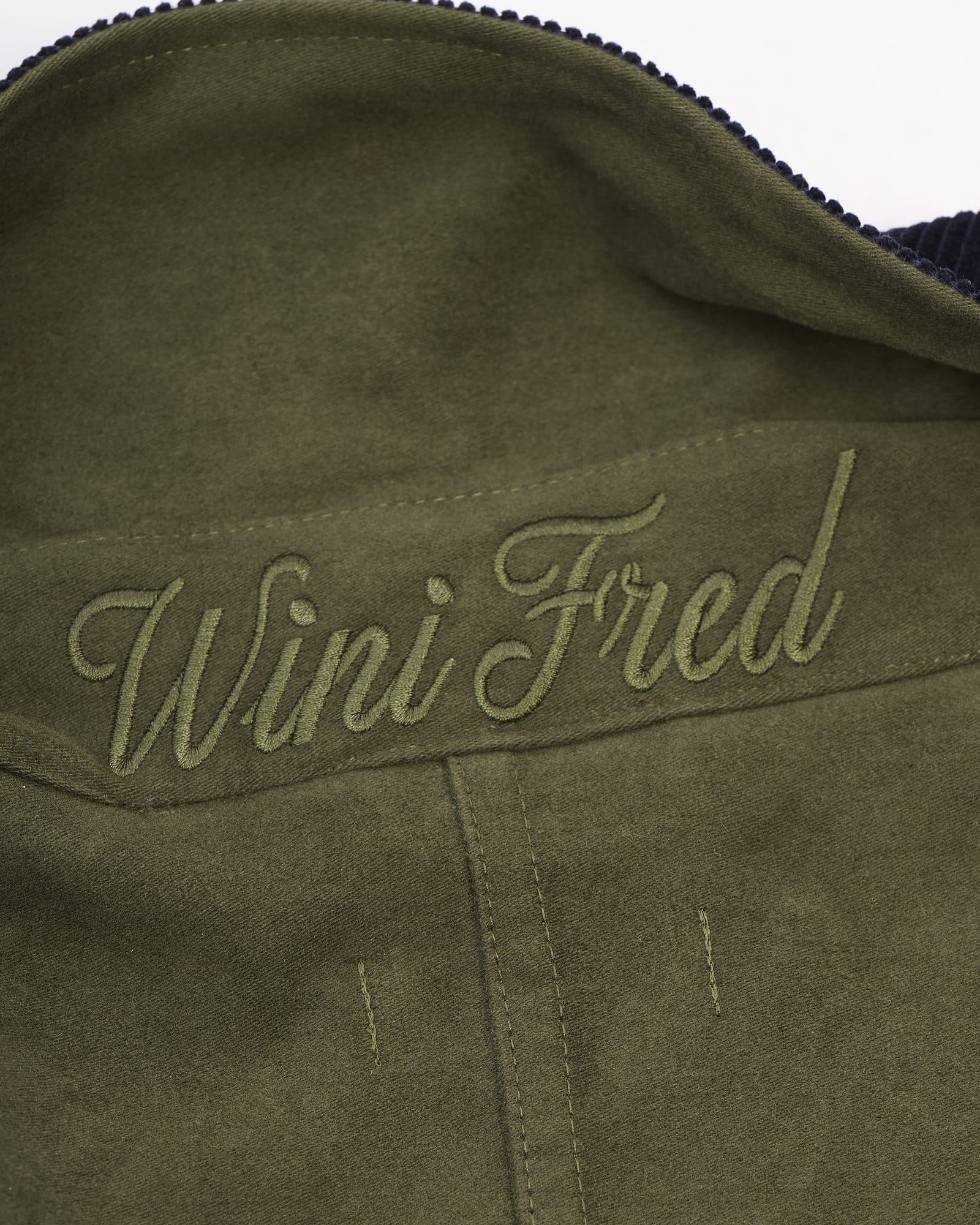 Wini Fred embroidery on the back