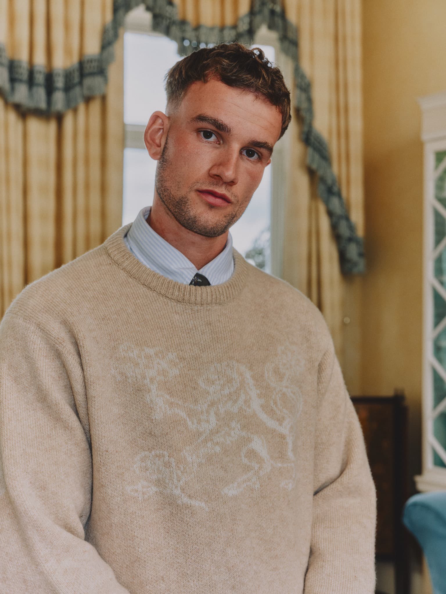 The lion knitted into the chest of the Heraldic knit
