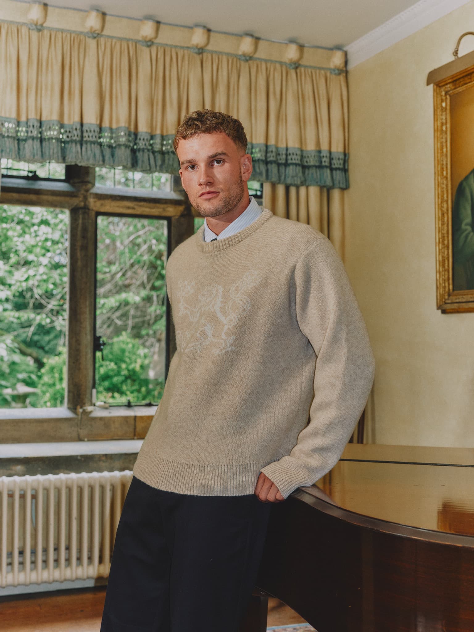Heraldic knit worn